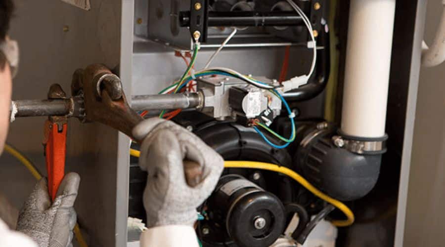 Lakeville heating experts RCL Mechanical working on a boiler repair