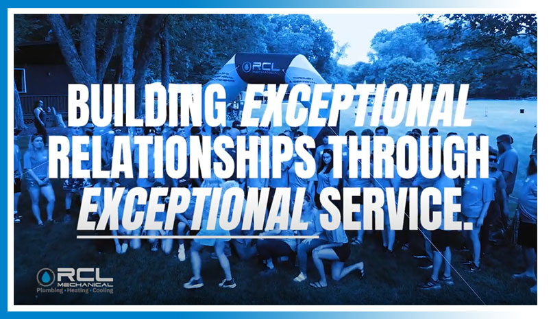 Group of people outdoors wearing matching shirts with large text overlay reading “Building exceptional relationships through exceptional service.